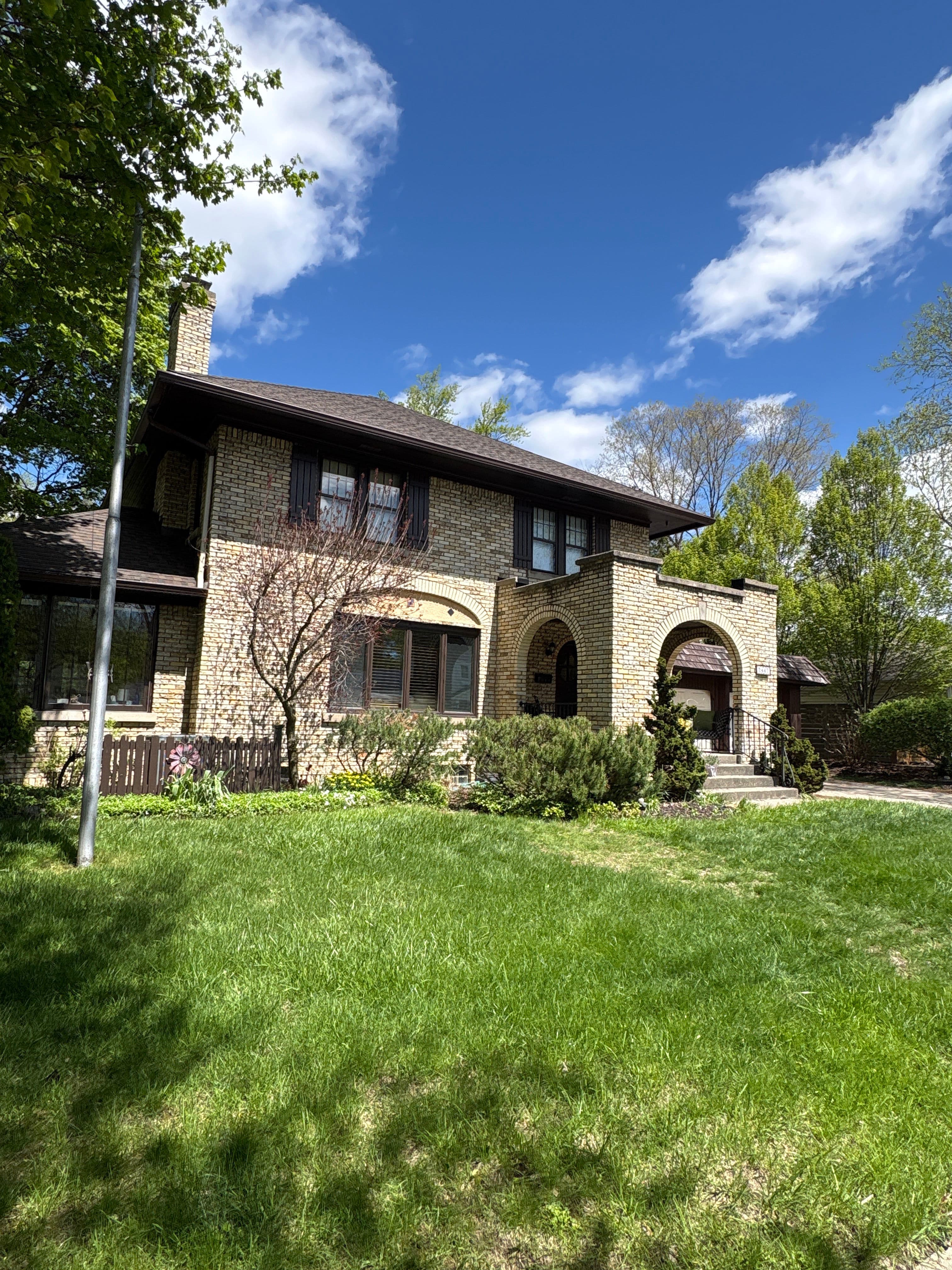 Project Window Cleaning for a Retirement Celebration at This Beautiful Brick Home image